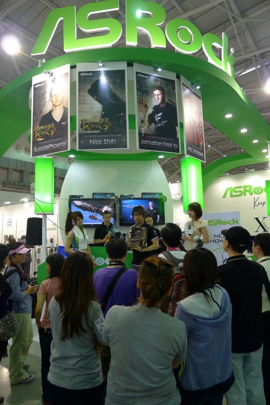 Visitors gathered at ASRock's booth for OC Show.jpg