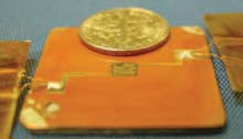 The thermoelectric cooler shown above (center gold square) is attached to a copper plate that is used to spread heat away from hot spots on chips.
