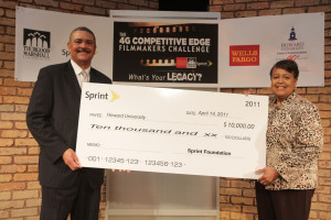 Sprint National Director of Public Safety Programs Dan Gillison presents a $10,000 check to Howard University School of Communications Dean Janette Dates. On behalf of Sprint Foundation, Sprint is making this donation as part of its ongoing commitment to education. (Photo: Sprint)
